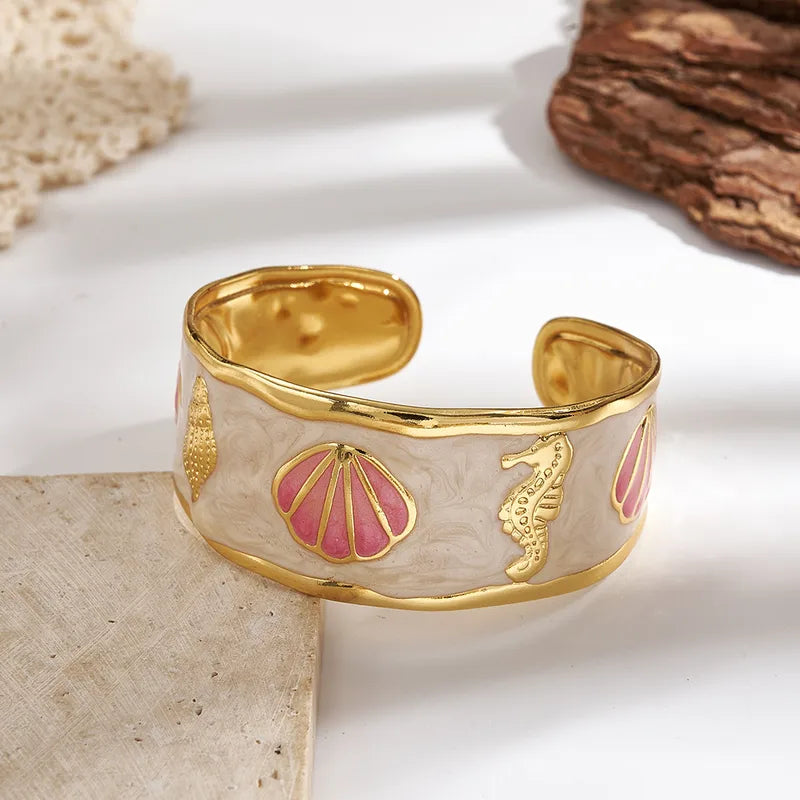 Βραχιόλι επιχρυσωμένο ατσάλι με ροζ κοχύλια - BR464