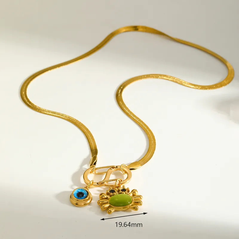 Κολιέ επιχρυσωμένο ατσάλι με καβούρι και μάτι - NE662