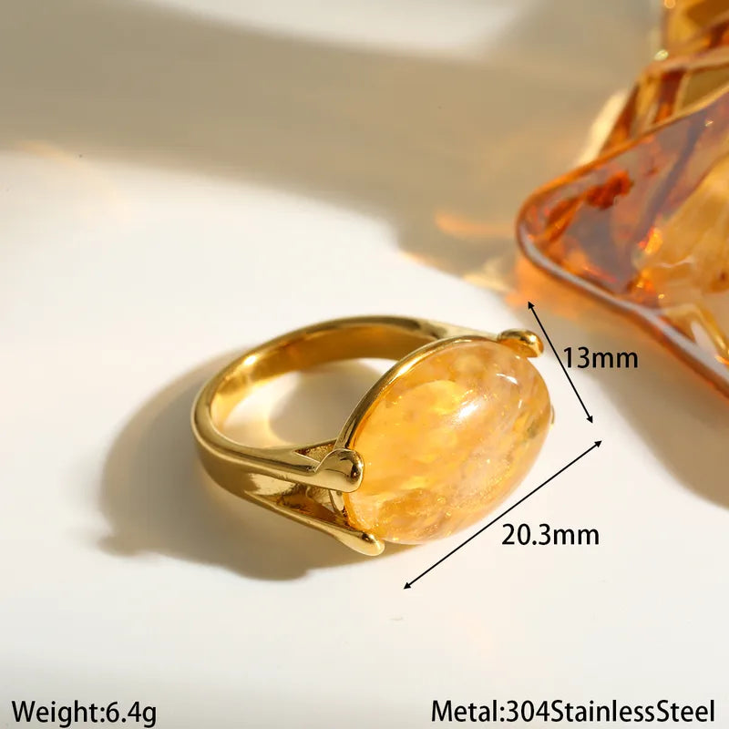 Inel din oțel placat cu aur cu piatră galbenă - R093