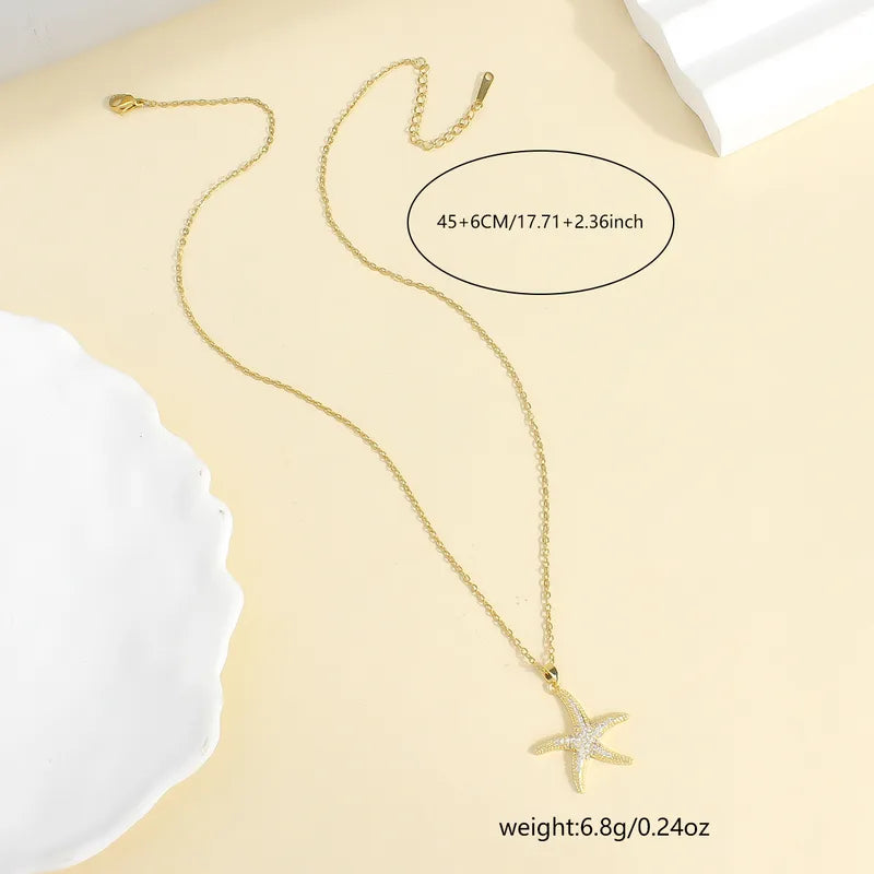 Κολιέ επιχρυσωμένο ατσάλι με αστερία και zircon - NE661