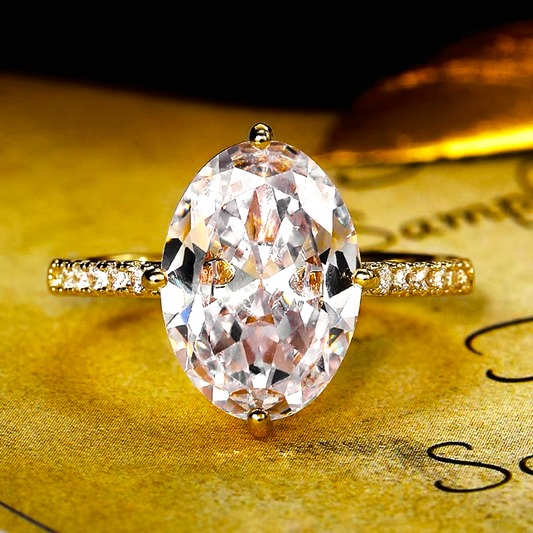 *Δαχτυλίδι χρυσό με κεντρικό οβάλ ζιργκόν και περιμετρικά ζιργκόν - R178