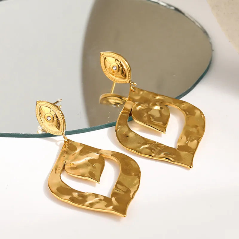 Dreifache Creolen aus Stahlgold – EA649