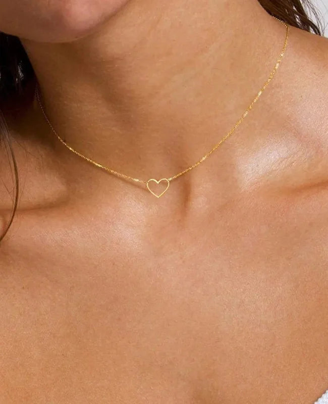 Steel necklace with thin golden heart- NE058