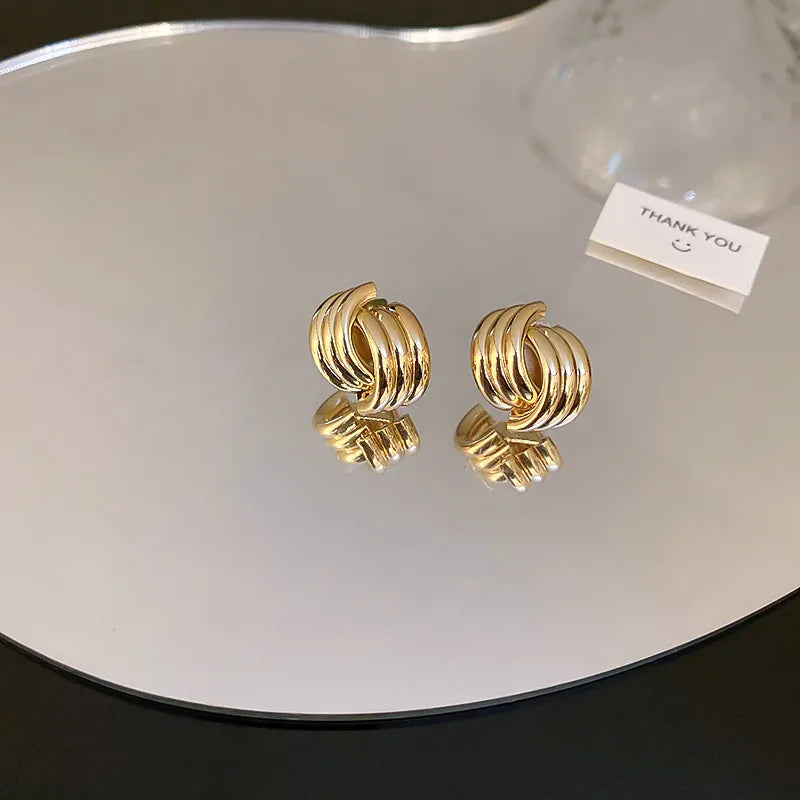 Brincos de latão Chrysa - w044