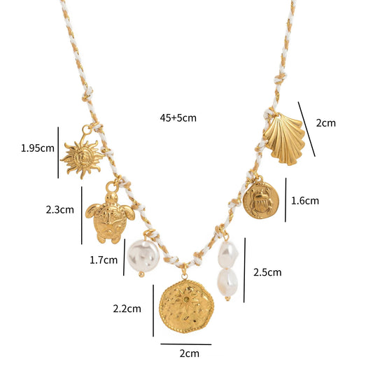 Necklace gilded steel with marine charms pearls and white rope-