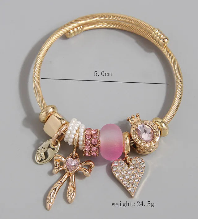 Βραχιόλι επιχρυσωμένο ατσάλι με ροζ charms-BR486