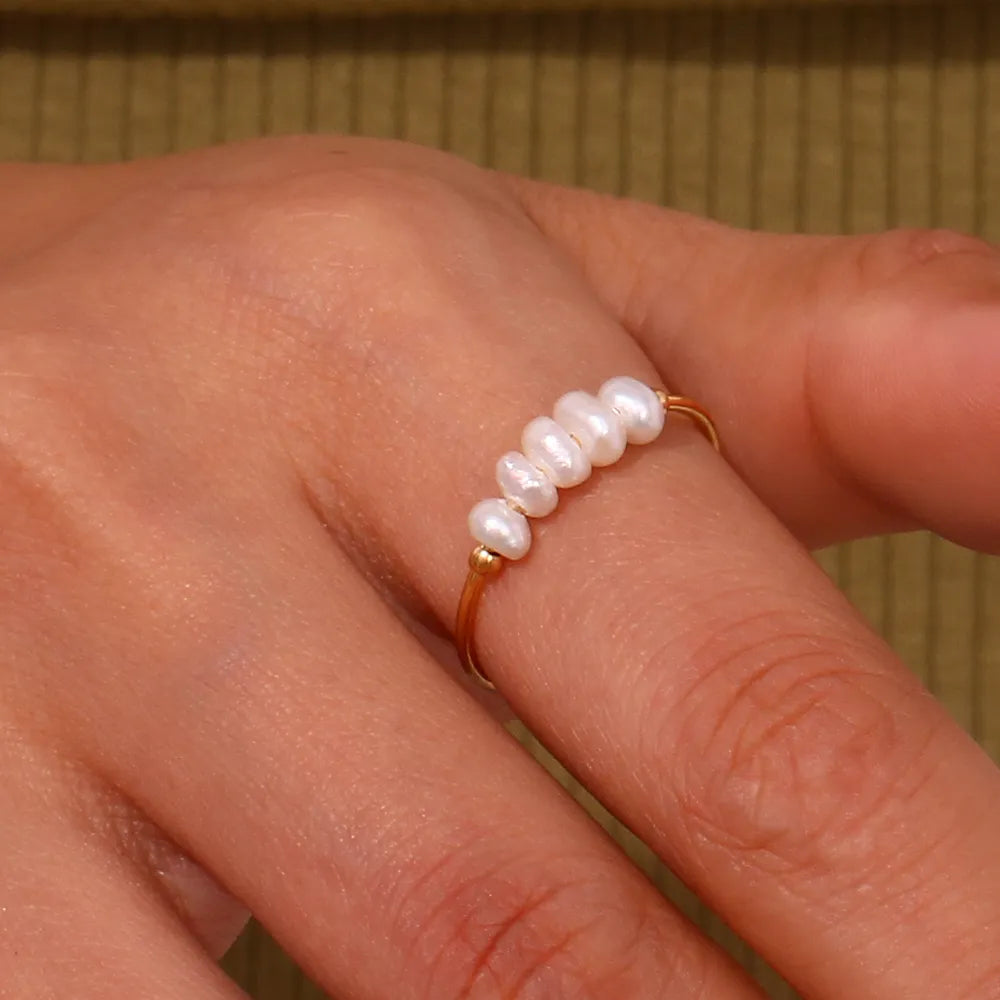 Thin steel ring with pearls - R104