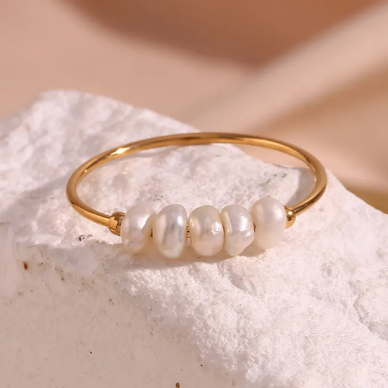 Thin steel ring with pearls - R104
