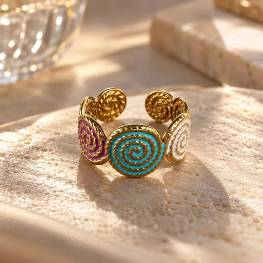 Anello in acciaio colorato con spirali - R114