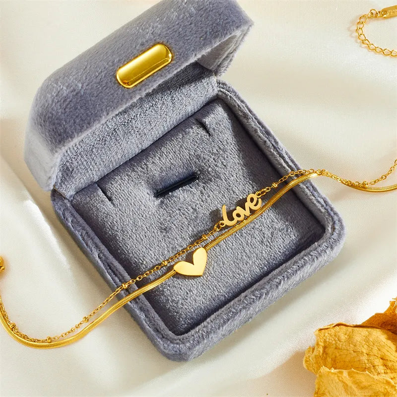 Bracelet à pied acier en or avec amour-an047 Inscription