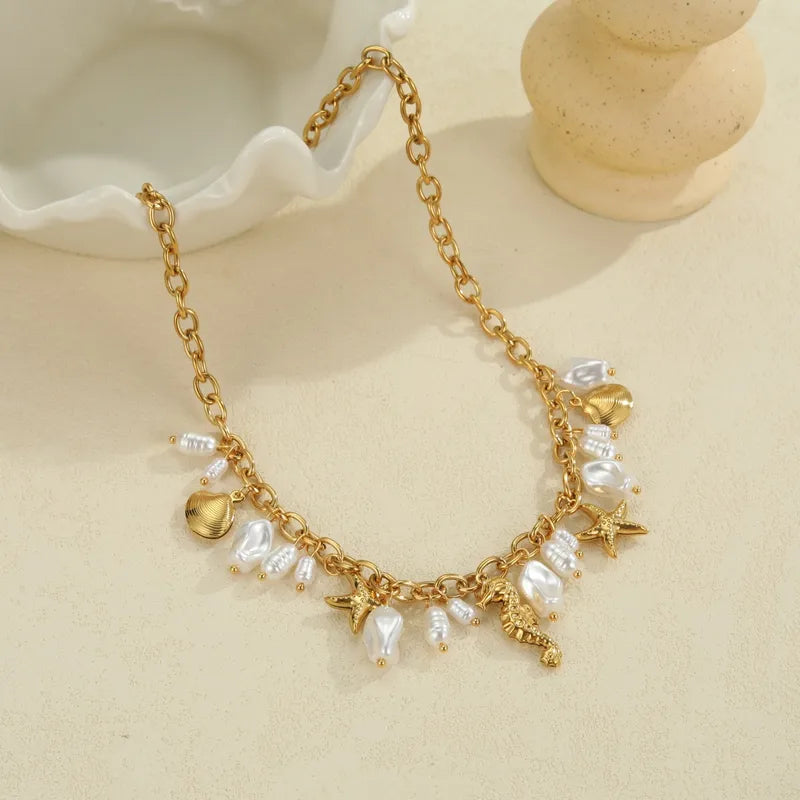 Κολιέ ατσάλινο με πέρλες και χρυσά στοιχεία - NE610