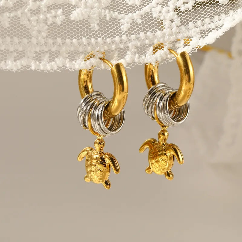 Steel gold earrings with turtles and silver hoops- EA712-