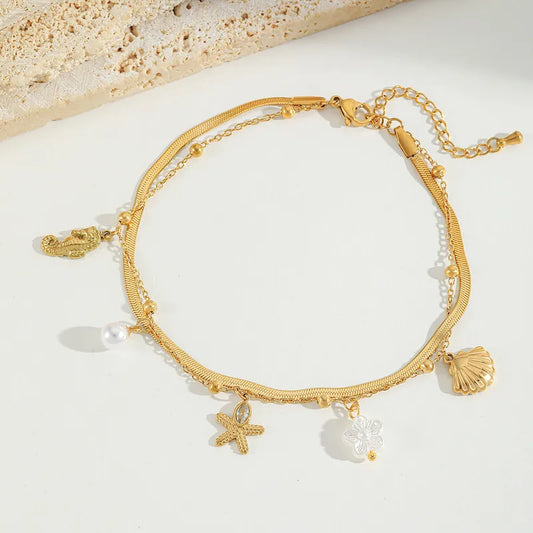 Βραχιόλι ποδιού ατσάλινο χρυσό με καλοκαιρινά στοιχεία- AN011