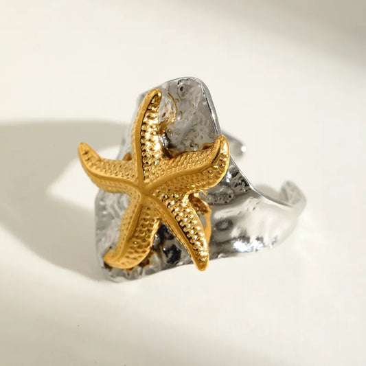 Steel silver rings with gold starfish -
