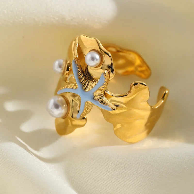 Ring Gilded Steel with Starfish and Pearls