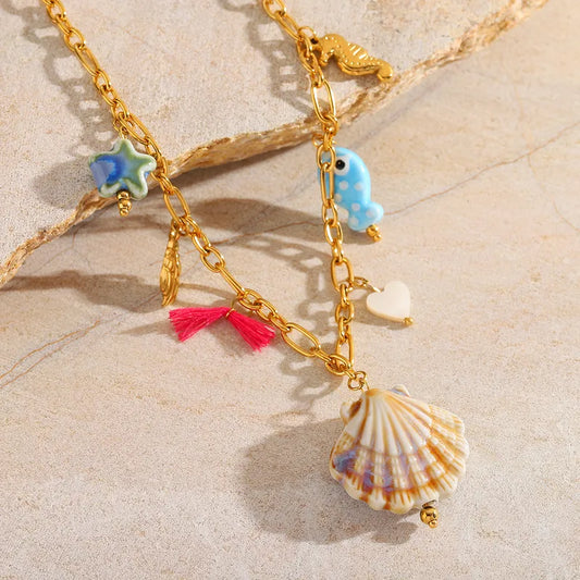 Κολιέ ατσάλινο με κοχύλι και charms- ne691