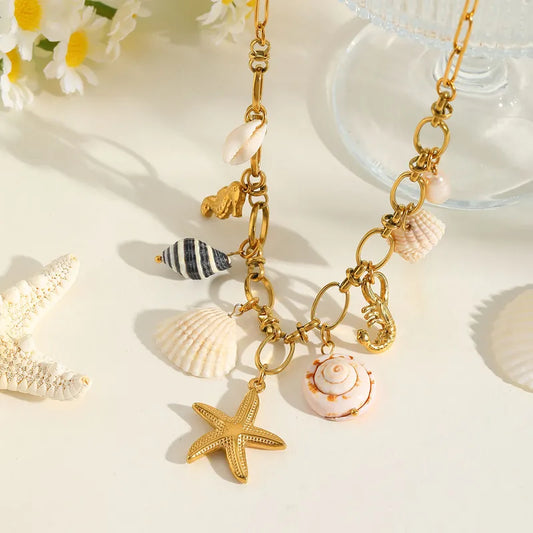 Κολιέ επιχρυσωμένο ατσάλι με αστερία και διάφορα κοχύλια- NE631