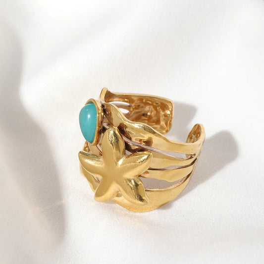Ring Gilded Steel with Starfish and Blue Stone