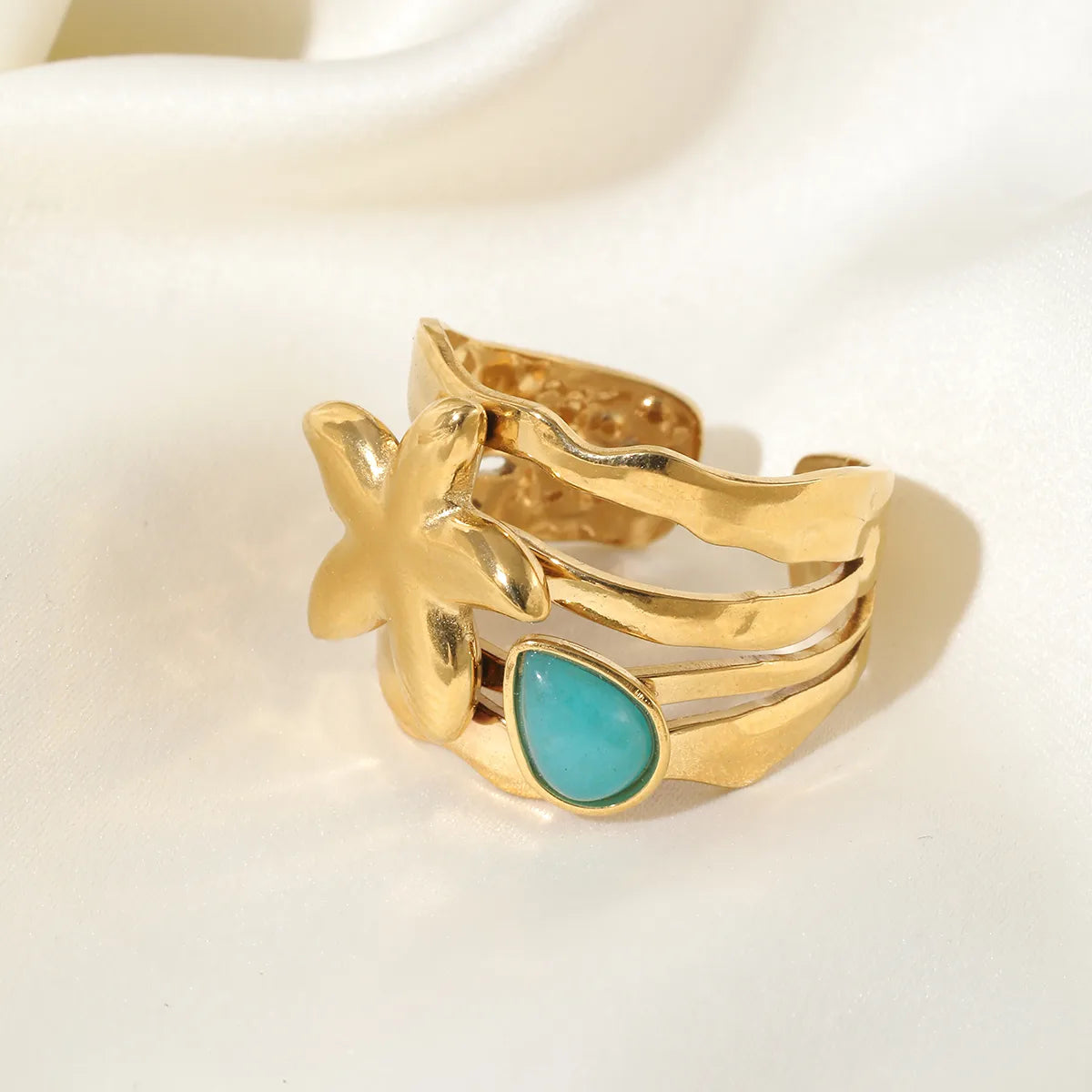 Ring Gilded Steel with Starfish and Blue Stone