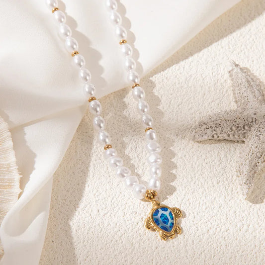 *Necklace Gold Plum with blue turtle and chain of pearls-ne427