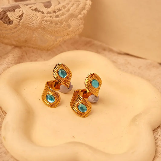 Anello Gold Grafico con pietre blu-R145