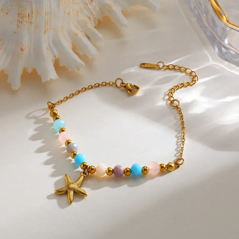 Βραχιόλι ατσάλινο με αστερία και χάντρες - BR342