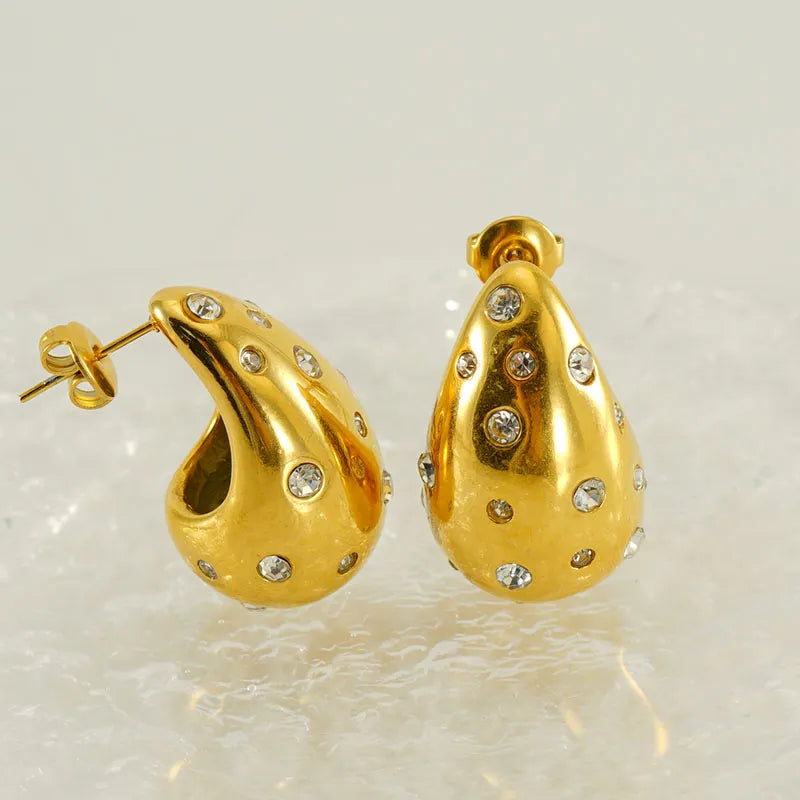 Σκουλαρίκια χρυσά ατσάλινα με zircon σχήμα δάκρυ - ea397