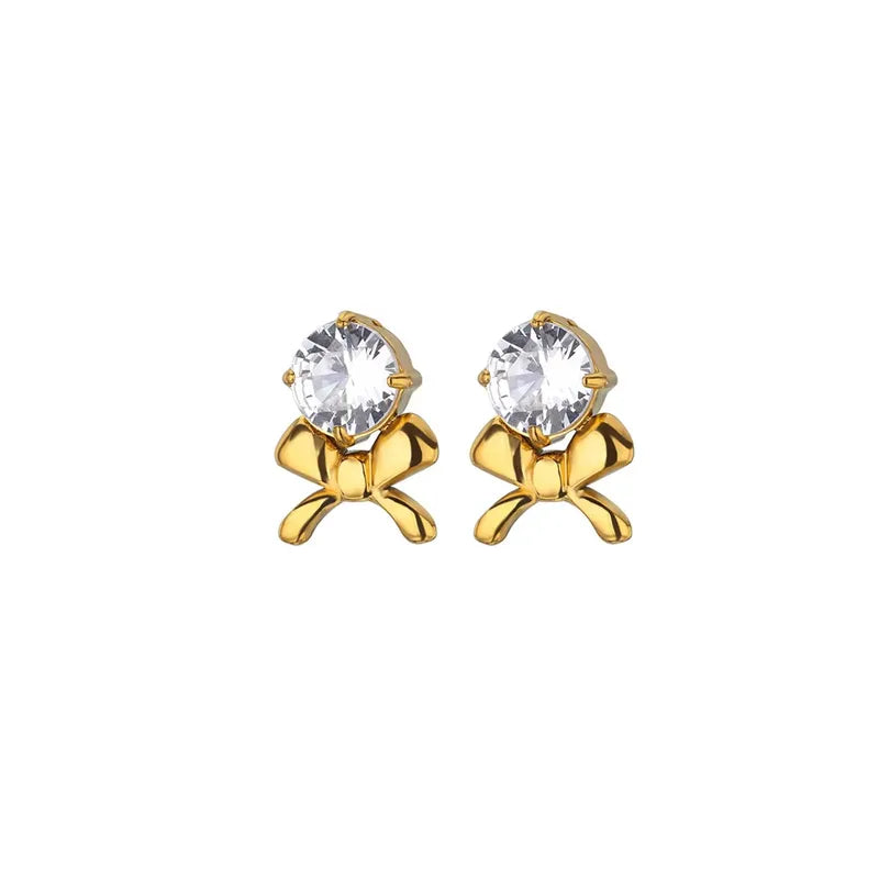 Earrings golden bow with zircon-ea397