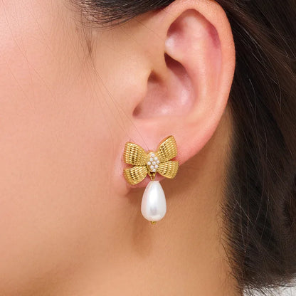 Earrings gilded steel with bow and pearl-ea497