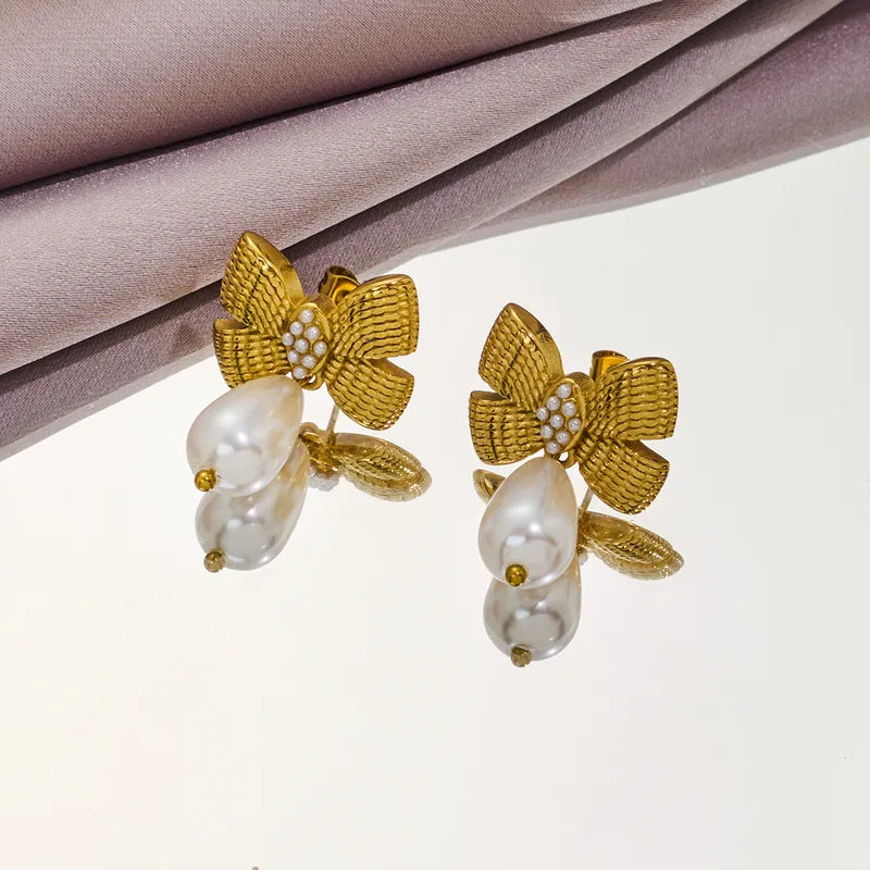 Earrings gilded steel with bow and pearl-ea497