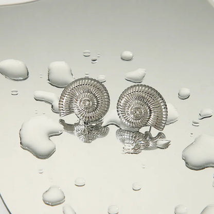 Cercei din oțel cu scoici - w040