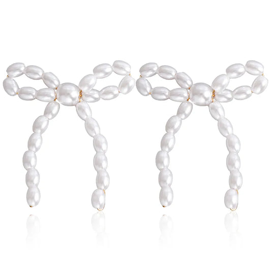 Earrings with bows with artificial pearls - EA490