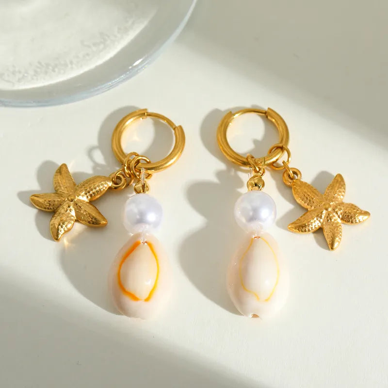 Starsters with starfish and shell -