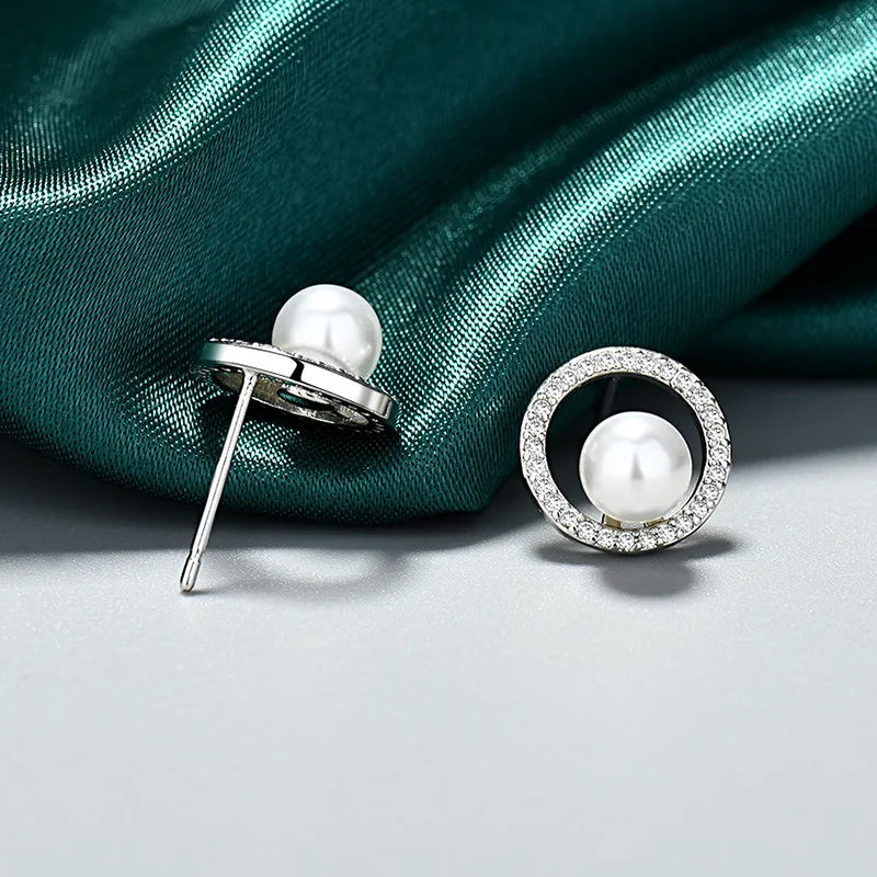 *Σκουλαρίκια πέρλες με στεφάνι από zircon - EA370