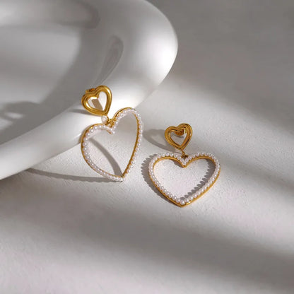 Earrings gilded steel with double heart -ea307