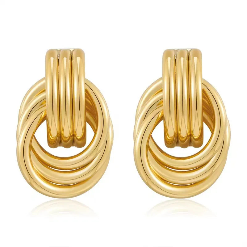 Earrings gold brass double knot-ea581