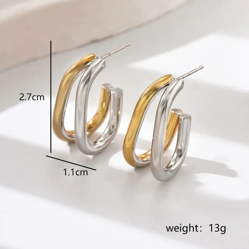 Oval steel earrings with gold and silver color-ea322