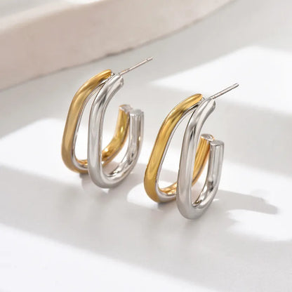 Oval steel earrings with gold and silver color-ea322