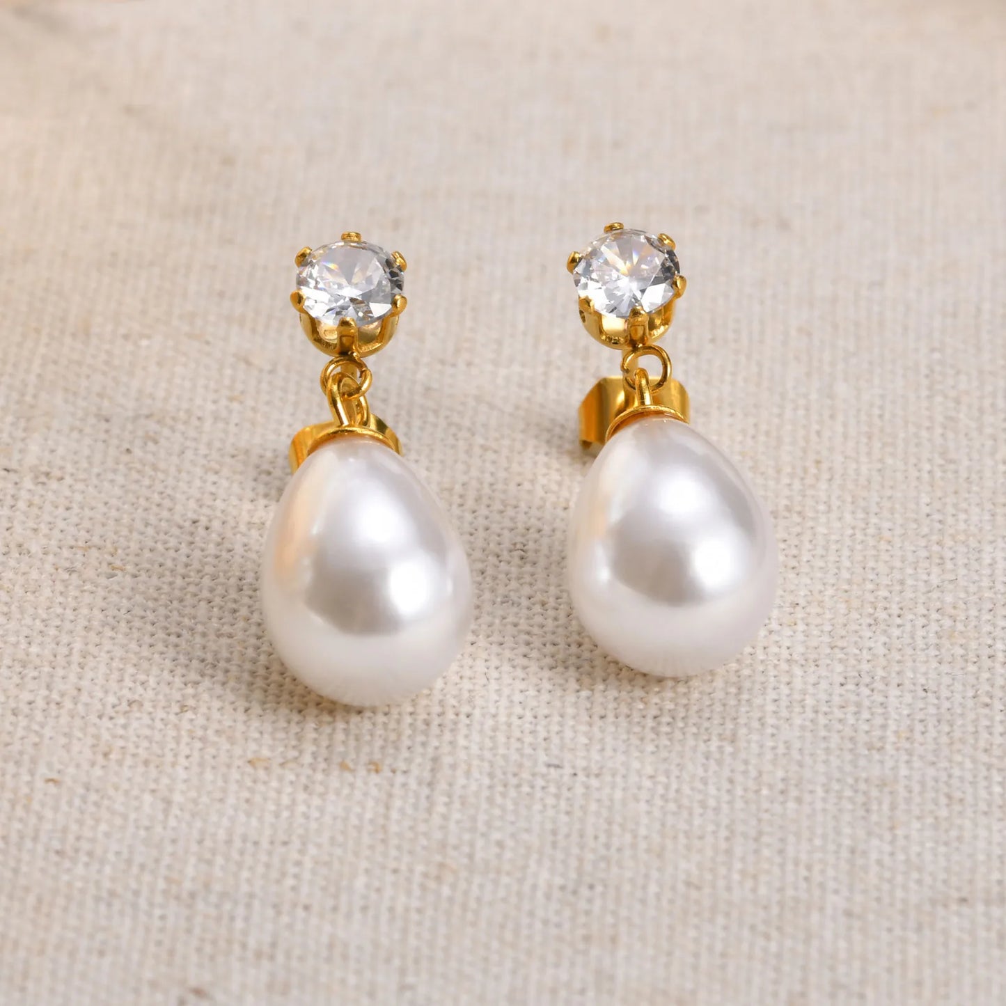 Earrings gold steel with oval pearl and stone-ea427