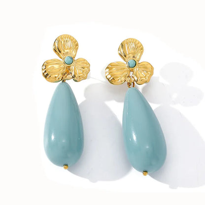 Orecchini conchiglia in acciaio bianco con perla - EA756