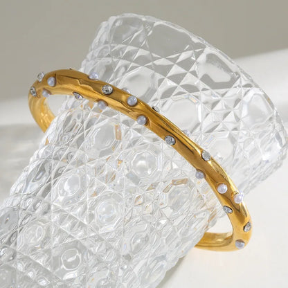 Βραχιόλι επιχρυσωμένο ατσάλι με πέρλες και zircon -  BR503