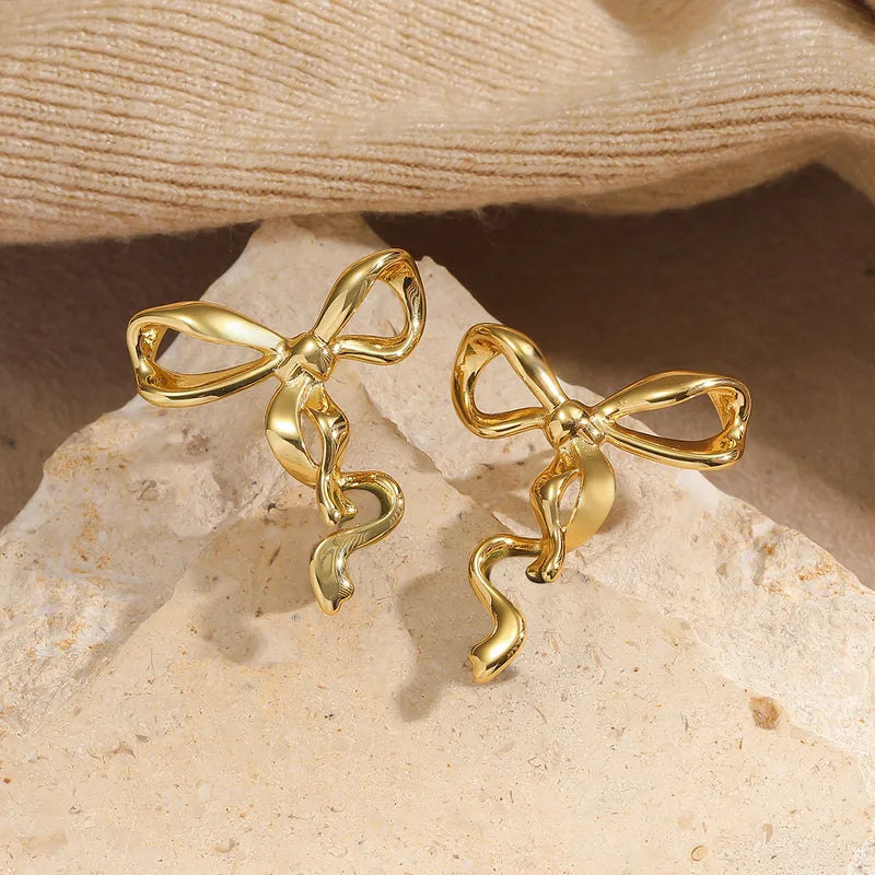 Σκουλαρίκια επιχρυσωμένο ατσάλι φιόγκος-EA673