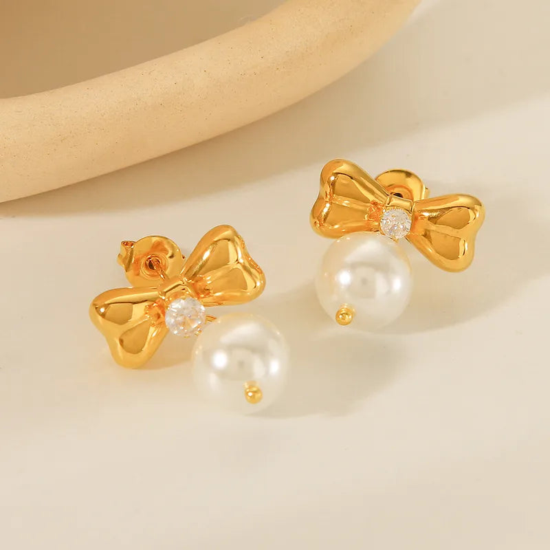 Σκουλαρίκια ατσάλινα με φιογκάκια- w583