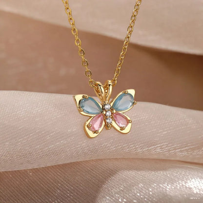 Collier papillon en acier avec zircons bleus et roses- NE487