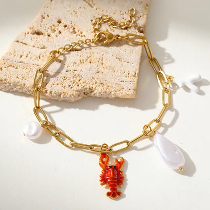 Bratara din otel placat cu aur cu homar si perle-