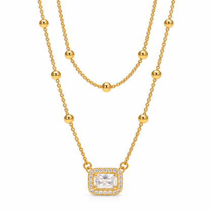 Collana in acciaio dorato con zirconi blu - NE713