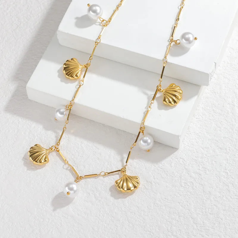 Κολιέ ατσάλινο με κοχύλια και πέρλες - ne603