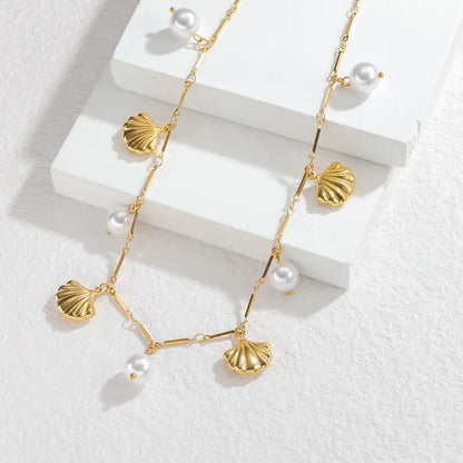 Κολιέ ατσάλινο με κοχύλια και πέρλες - ne603