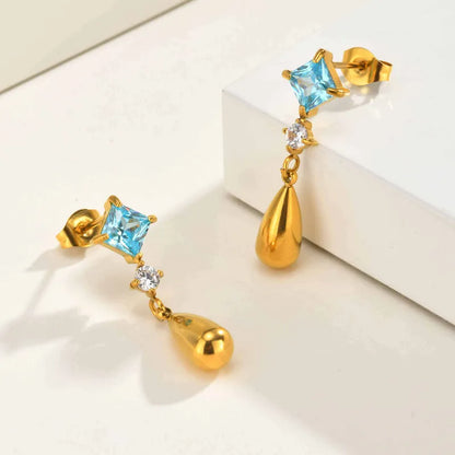 Stahlgoldohrringe mit blauem Zirkon – EA378