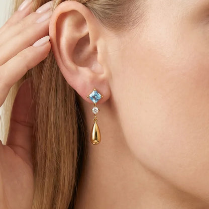 Stahlgoldohrringe mit blauem Zirkon – EA378